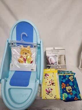 NEWBORN BABY 1TUB,1BATH MITT, 3CLOTH DIAPERS & 3BAGS 1 REVERSABLE HEAD SUPPORT